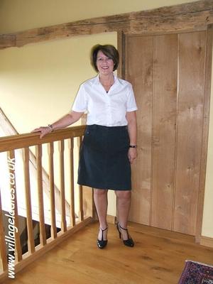 Kelly - white blouse black skirt