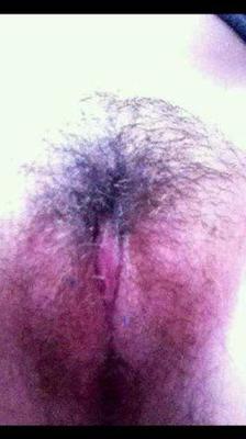 Horny teen exposing her hairy pussy and big tits
