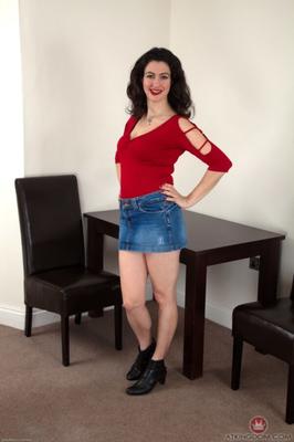 Dark hair mature shows off her hairy pits and pussy again.