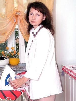 Mature Jane getting horny over doing the ironing