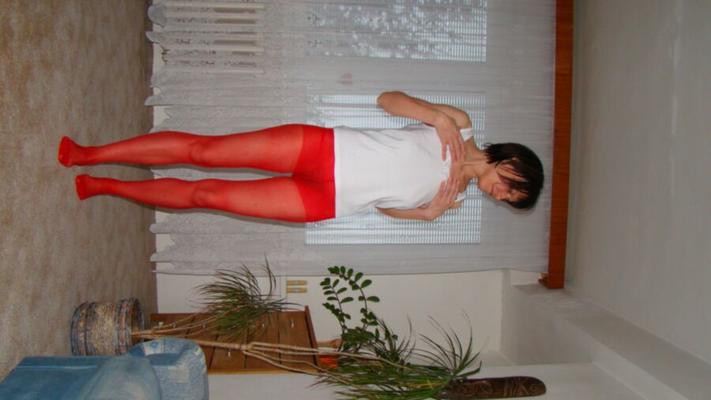 Red nylons and sweet brunette