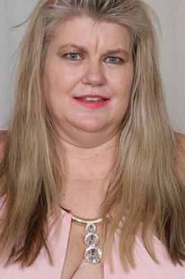 Mature blond BBW pleasures her hairy pussy.