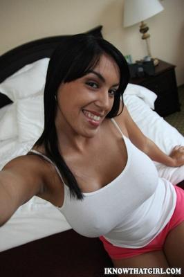 Busty gal enjoying a dildo