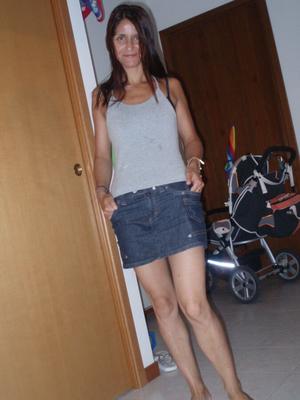 Sexy slender wife stripping at home