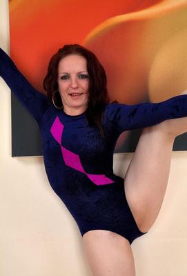 Slender pale skinned redhead with a hairy bush bonita