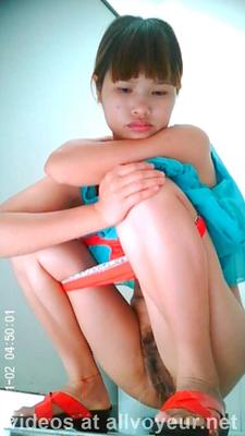 Bathroom Shot Panoramic front shot of a young lady pee 